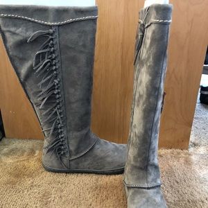 Gorgeous UGG Moccasin boots with fringe. Rare!